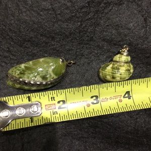 Pair of green shell necklaces outlined in gold